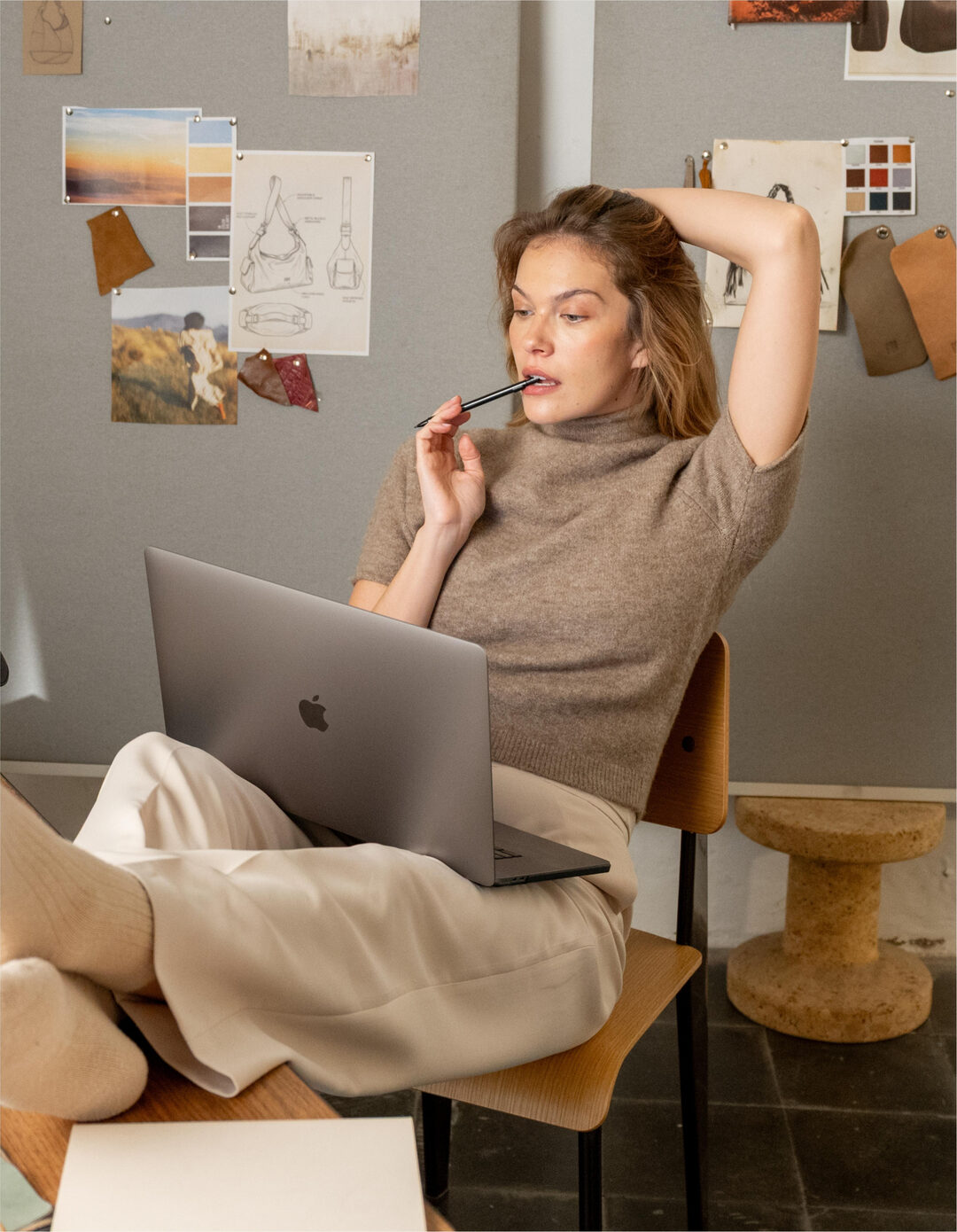 A designer working at the studio inspiration board